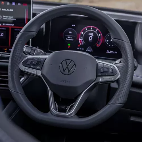 Leather-wrapped multi-function steering wheel
